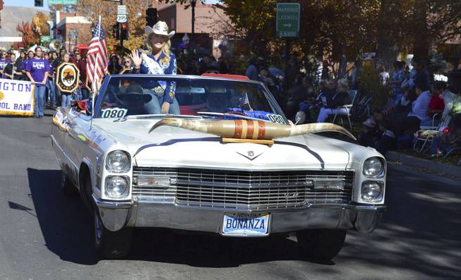 Miss Rodeo Nevada Tara Bowlby rides in the Nevada Day parade in Carson City on Oct. 26, 2013, in a car sponsored by the Bonanza Casino.
